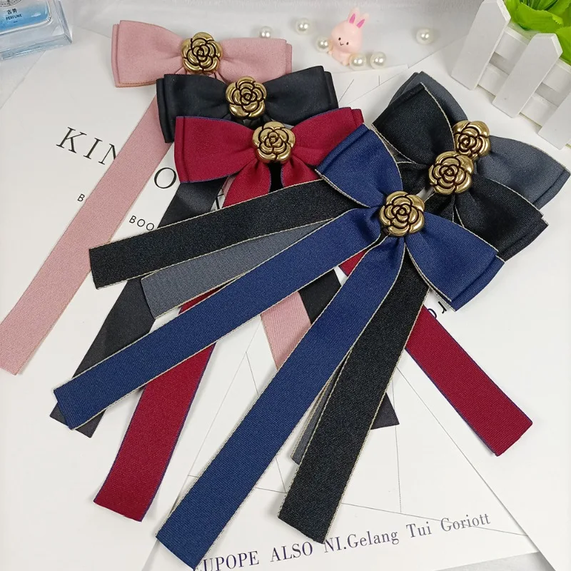 Spilla con fiocco in tessuto retrò fiore di camelia corpetto stile College spille per colletto camicia elegante accessori per gioielli con distintivo Bowknot