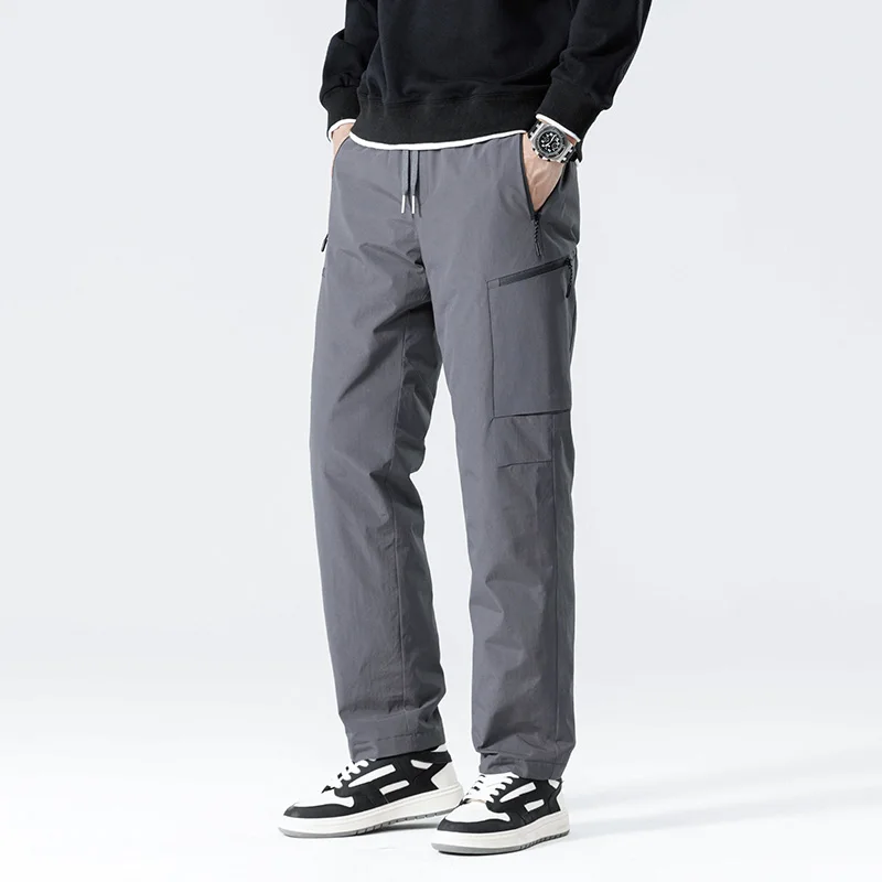 Thickened warm down pants men's senior sense of rushing pants winter outside the windproof sports drawstring casual pants