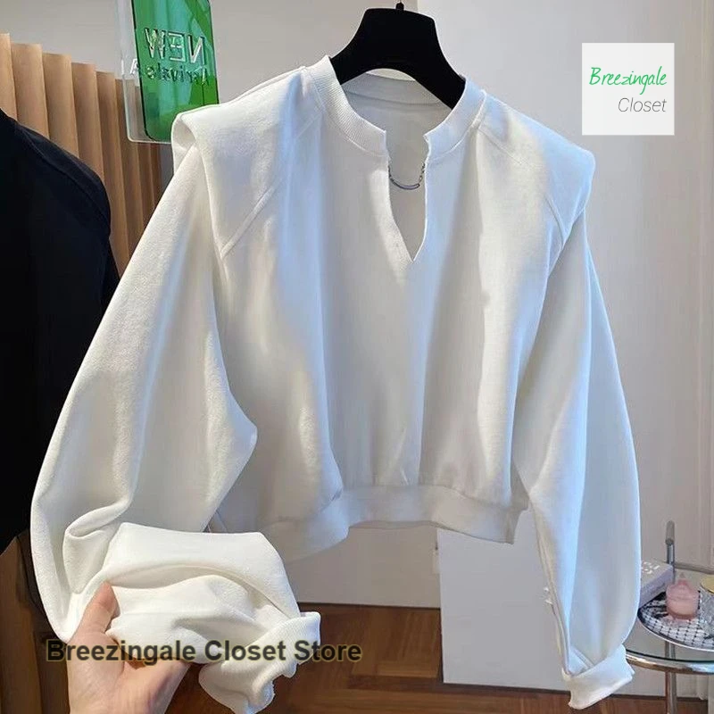 Französischer Stil V-Ausschnitt Schulterpolster kurzer Pullover Damen Frühling und Herbst neue Mode lässig lockeres Nischen-Bottom-Shirt