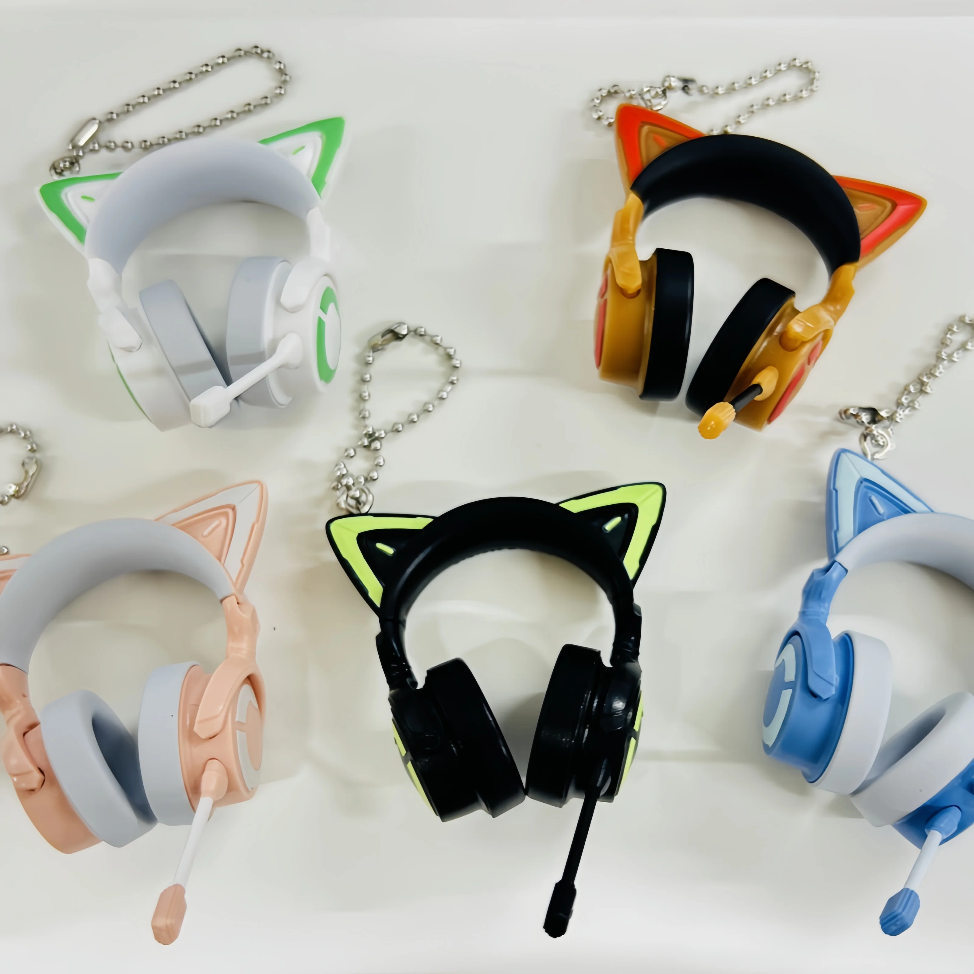 Spot japonés genuino Bandai Esports chica oreja de gato Yowu auriculares Mini colgante accesorio colgante huevo retorcido