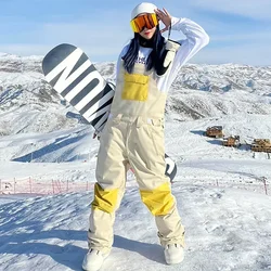 Mono con tirantes de esquí para hombre y mujer, pantalones de snowboard para deportes al aire libre, monos cálidos a prueba de viento, pantalones de nieve impermeables, novedad de invierno, 2025