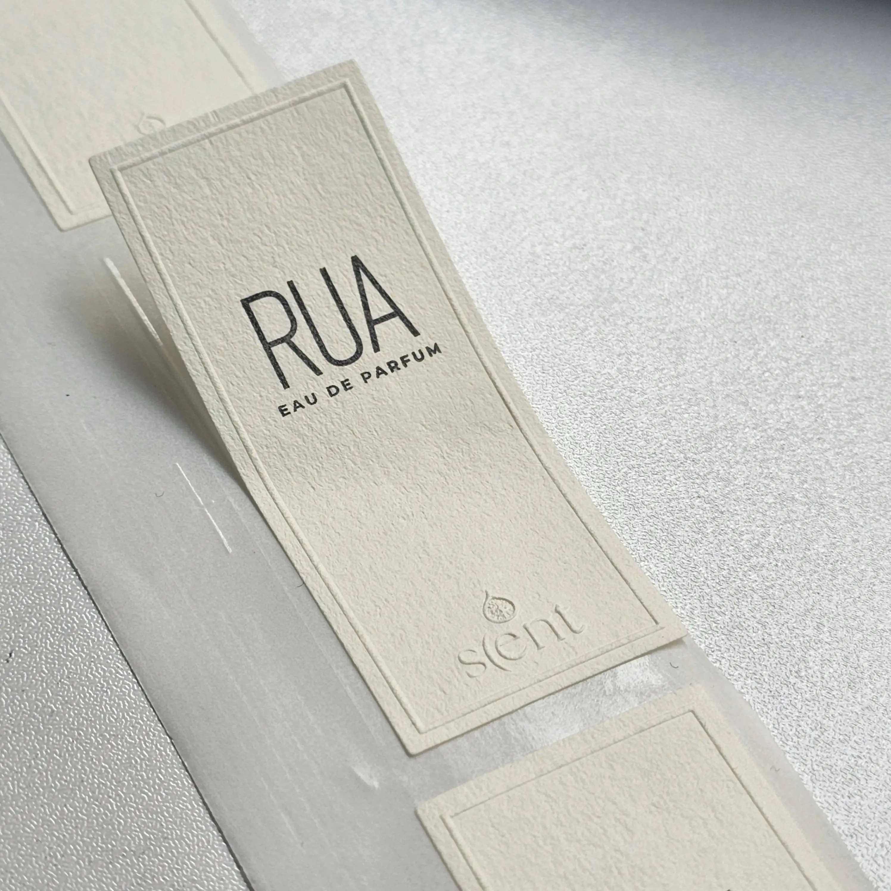 customized-3d-embossed-logo-texture-paper-adhesive-label-matte-textured-box-sealing-sticker-candle-label