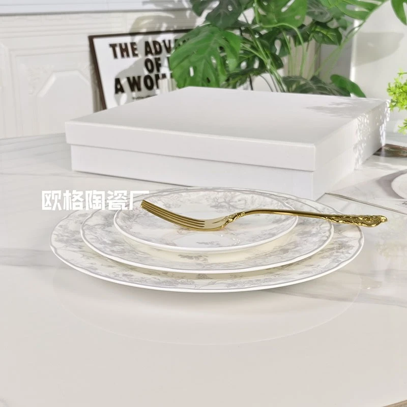 ชุดอาหารค่ำสไตล์ตะวันตกทำจากกระดูกจีน จานสวยงามสำหรับงานเลี้ยง ร้านอาหาร และใช้ในบ้าน