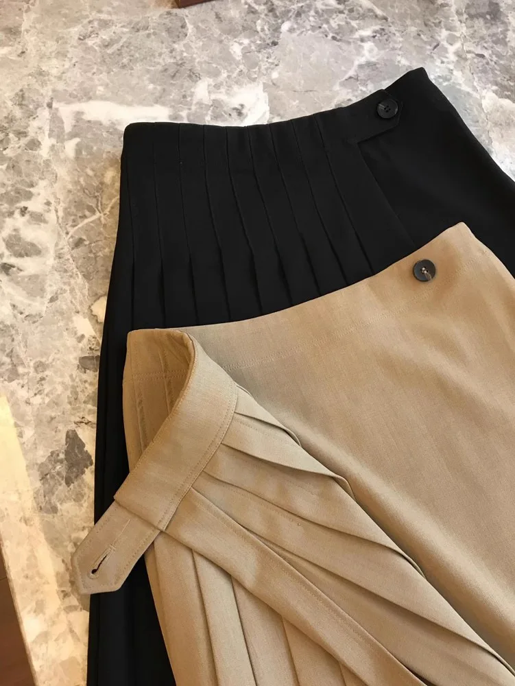 Primavera e outono feminino casual cor sólida cintura alta plissada saia de meio comprimento