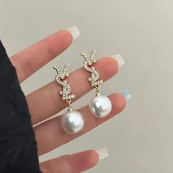 Pendientes de perlas de estilo lineal elegante, aguja de plata, temperamento elegante, joyería con lazo, pendientes colgantes, pendientes de perlas 2024