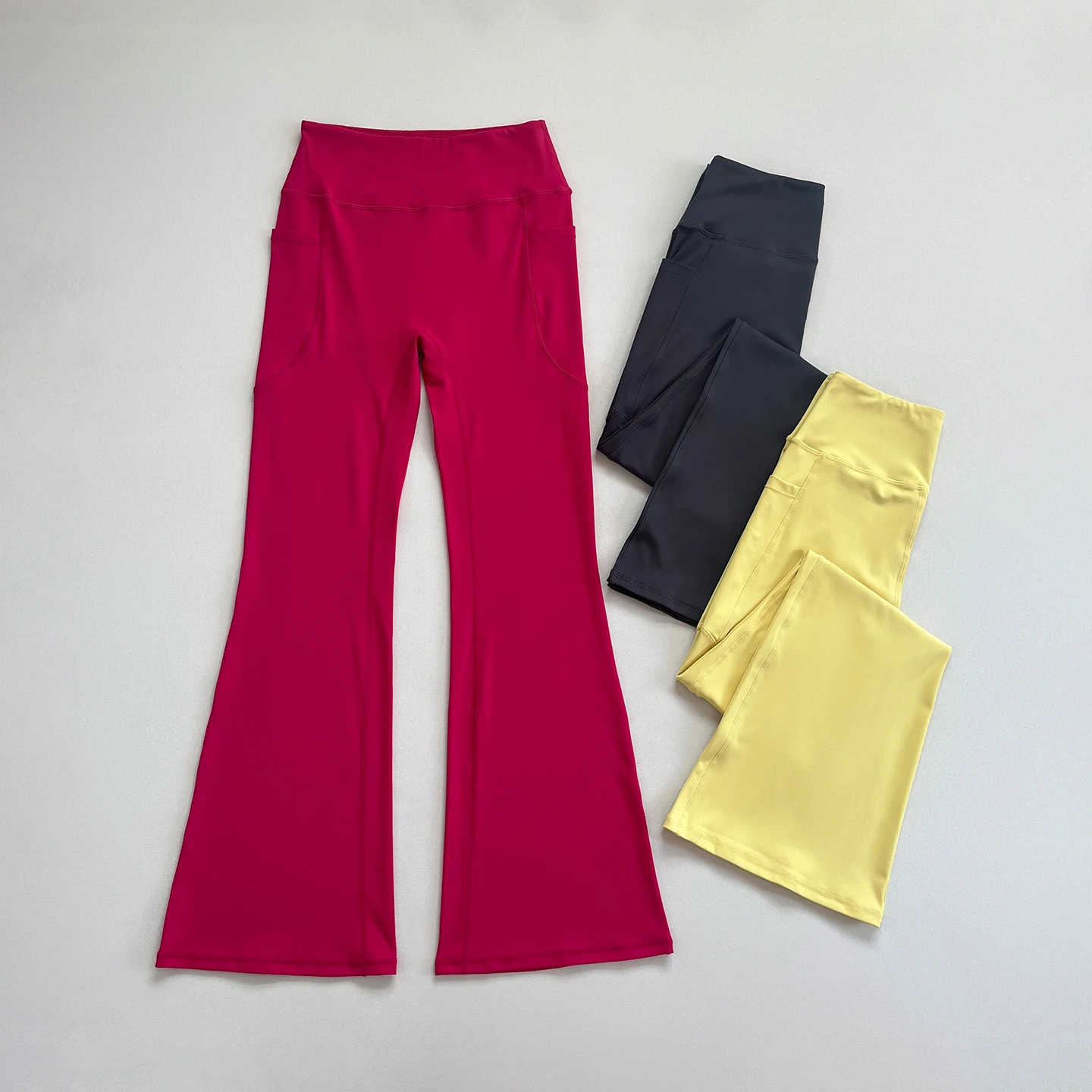 

New High - Waisted Flare Yoga Pants, with side pockets, high - waisted and tummy - controlling, suitable for workouts.