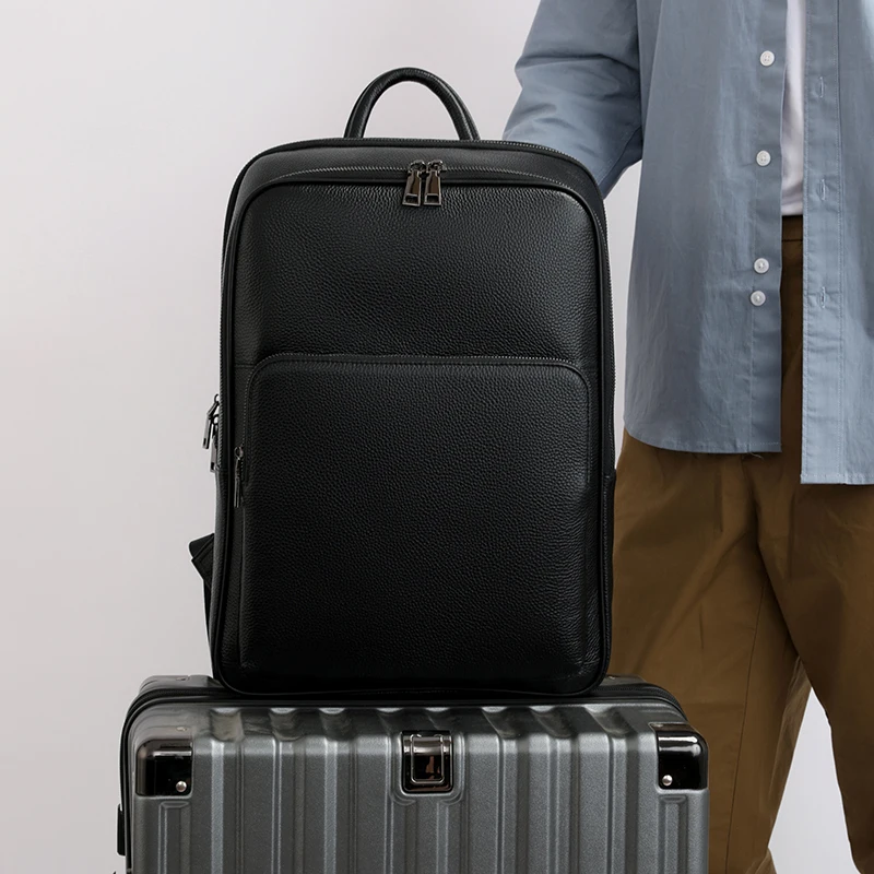 100% بقرة جلد طبيعي الرجال حقائب الظهر موضة الجلد الطبيعي الحقيقي حقيبة ظهر الطالب الصبي العلامة التجارية الفاخرة حقيبة كمبيوتر محمول كبيرة