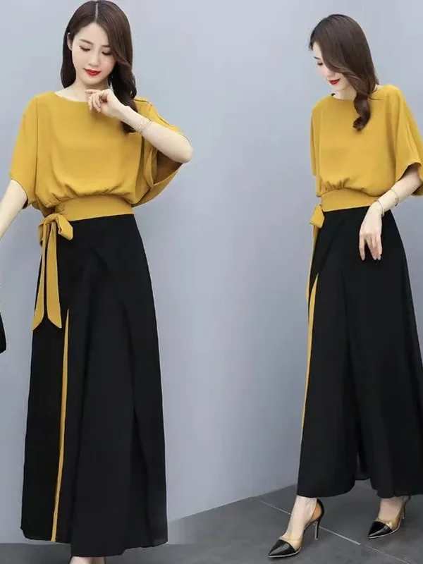 

Летний комплект для полных женщин: модный костюм из двух предметов с коротким рукавом и широкими брюками, универсальный стиль для любого возраста.