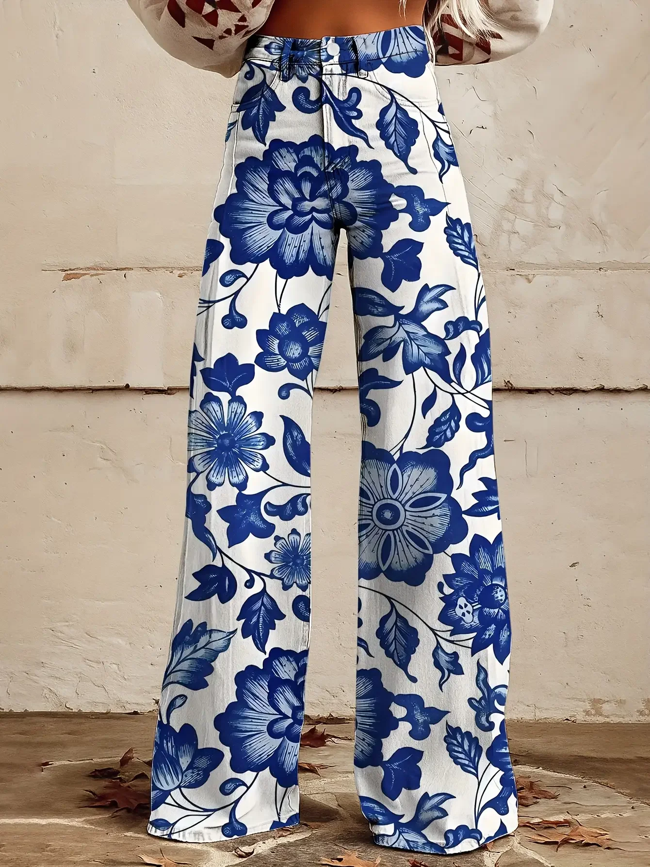  Casual jeans with colorful western prints, loose wide leg design, and fun printed women's pants.