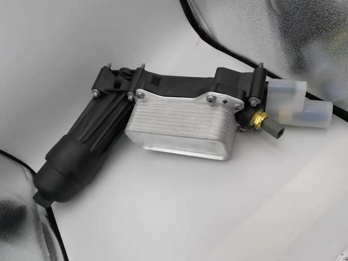 

Filter housing oil radiator assembly for Dodge OE: 68105583AF