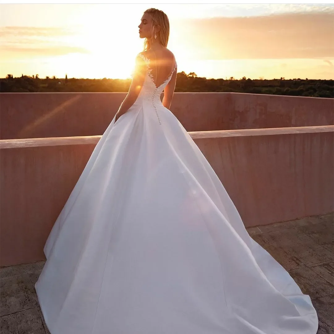 Robe de mariée longue classique avec poche, ligne A, manches chapeau en dentelle, plissée, train de balayage, robe de mariée de plage, robe perlée pour femme