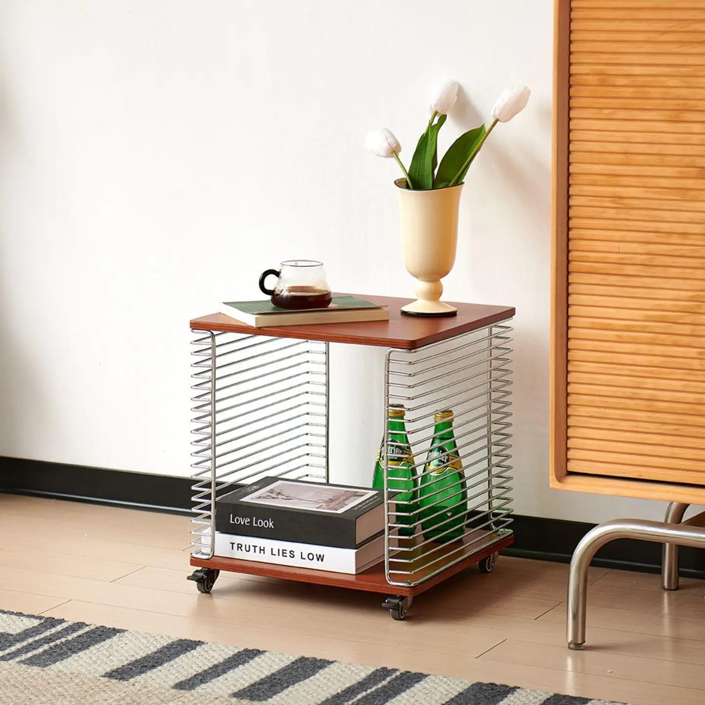 The living room is simple and modern multi-functional storage artifact with wheels and small apartments