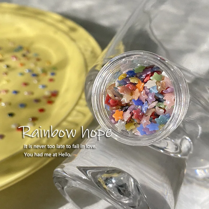 キャンディーカラーの艶をかけられたセラミックネイルアートパッチスイートスターネイルアートジュエリー