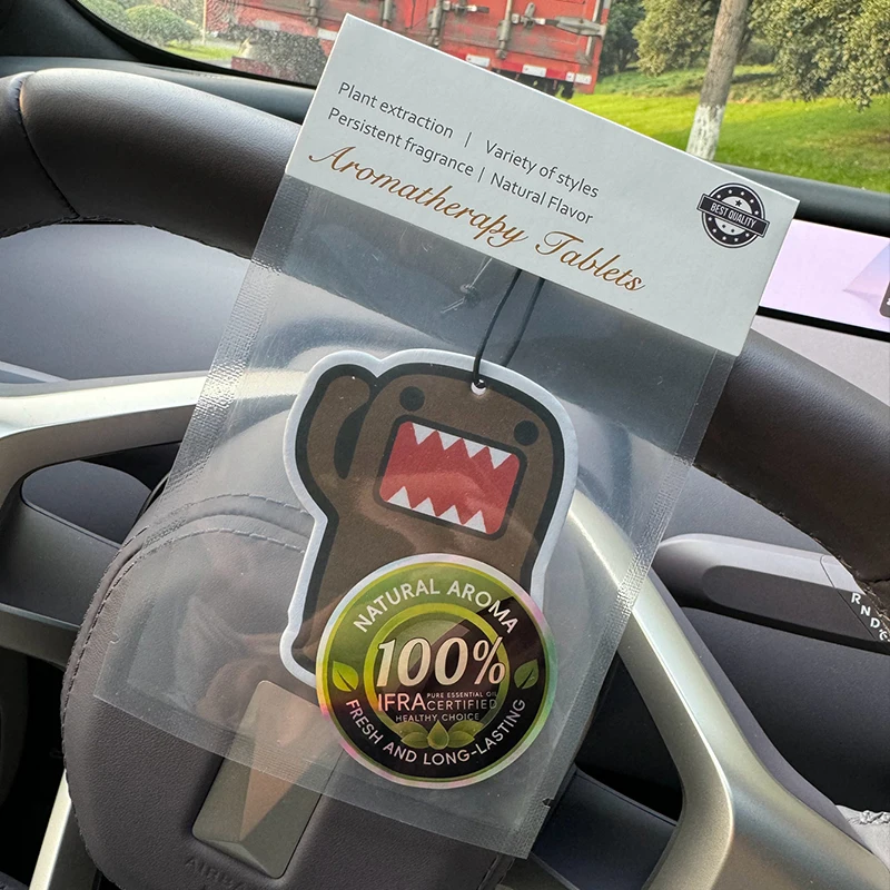 A Car Air Freshener with the Scent of Hilton (Hotel Scent) from the Jdm Crazy Bear Series |   Rearview Mirror Hanger & Dual-Purpose Air Vent Clip |   Natural Material Aromatherapy Tablets |   Long-Lasting Fragrance for 90 Days |   Alcohol-Free |   Not Afraid of Direct Exposure to the Sun |   Designed Specifically for Odor Removal in Cars, Closets, and Bathrooms. |   Cartoon Animation Graphics |   Unisex |   Luxury-Grade Fragrance |   Five-Star Hotel