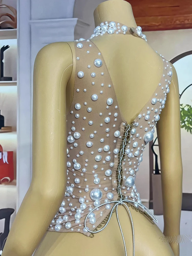 Wysokiej jakości seksowna bluzka z siateczki z gorącymi koralikami, na ramiączkach, z dekoltem typu halter, nowa modna odzież damska na zamówienie 2025