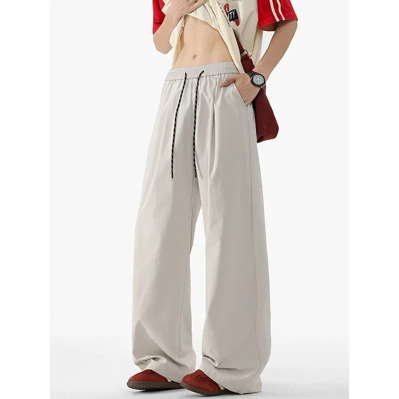 

Men's Pants Summer Casual Loose Wide Leg Pants Men Versatile Comfortable Breathable Hong Kong Style Loose Fit Streetwear Joggers
