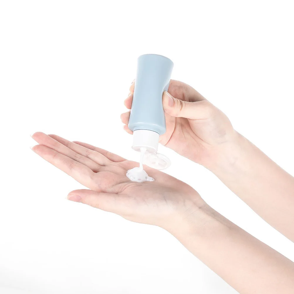 

4Pcs Travel Bottle Set 50ml Premium Plastic Squeeze Clamshell Leakproof Dispenser Bottle for Travel Camping Business Trip