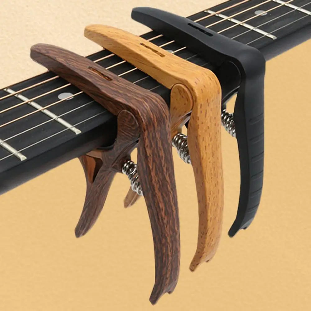 Capo de nailon para guitarra, abrazadera afinadora de guitarra, capó de gatillo de llave profesional para guitarras acústicas y eléctricas, capos de una sola mano
