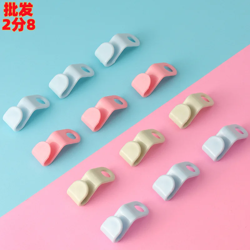 Stackable garment hanger connector hook for compact wardrobe organization • lightweight plastic design • supports 1 to 3 kg load