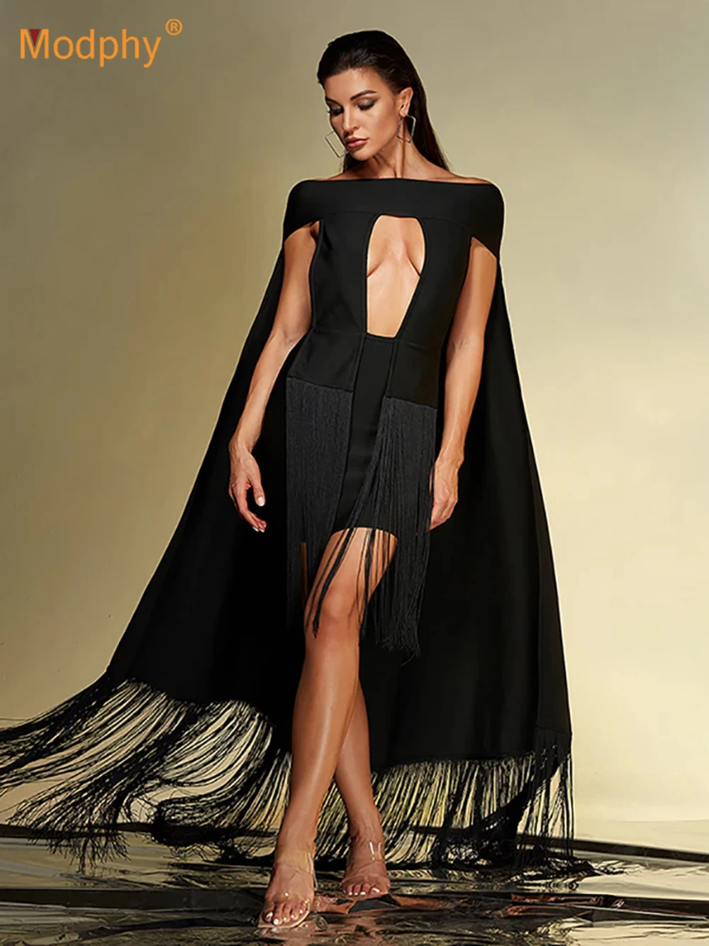 Modphy Sexy Slash Neck Hollow Out Tassel Cloak Design Mini Bandage Dress Women Black Sleevelss Fringe Dresses Evening Party Gown