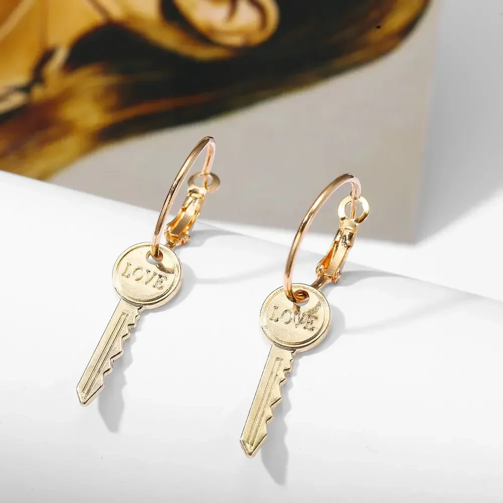 Delysia King   New key earrings