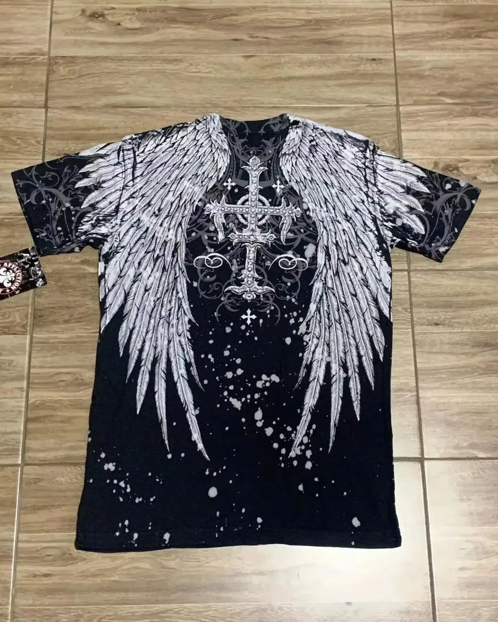 Camiseta de cuello redondo transpirable y cómoda para hombre, moda europea y americana de verano, top con estampado de cruz y alas para exteriores