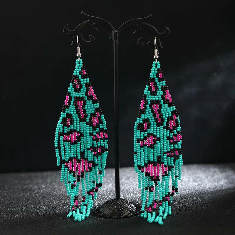 The Bohemian tide Fashionable Individuality Temperament Handwork Meter bead Leopard print series Tassel Long pattern Earrings