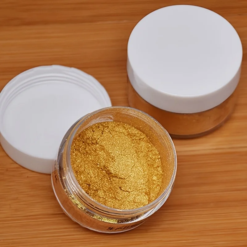 Polvo brillante dorado plateado, utilizado en arte de uñas, así como polvo decorativo brillante para pasteles, repostería y decoraciones de repostería.