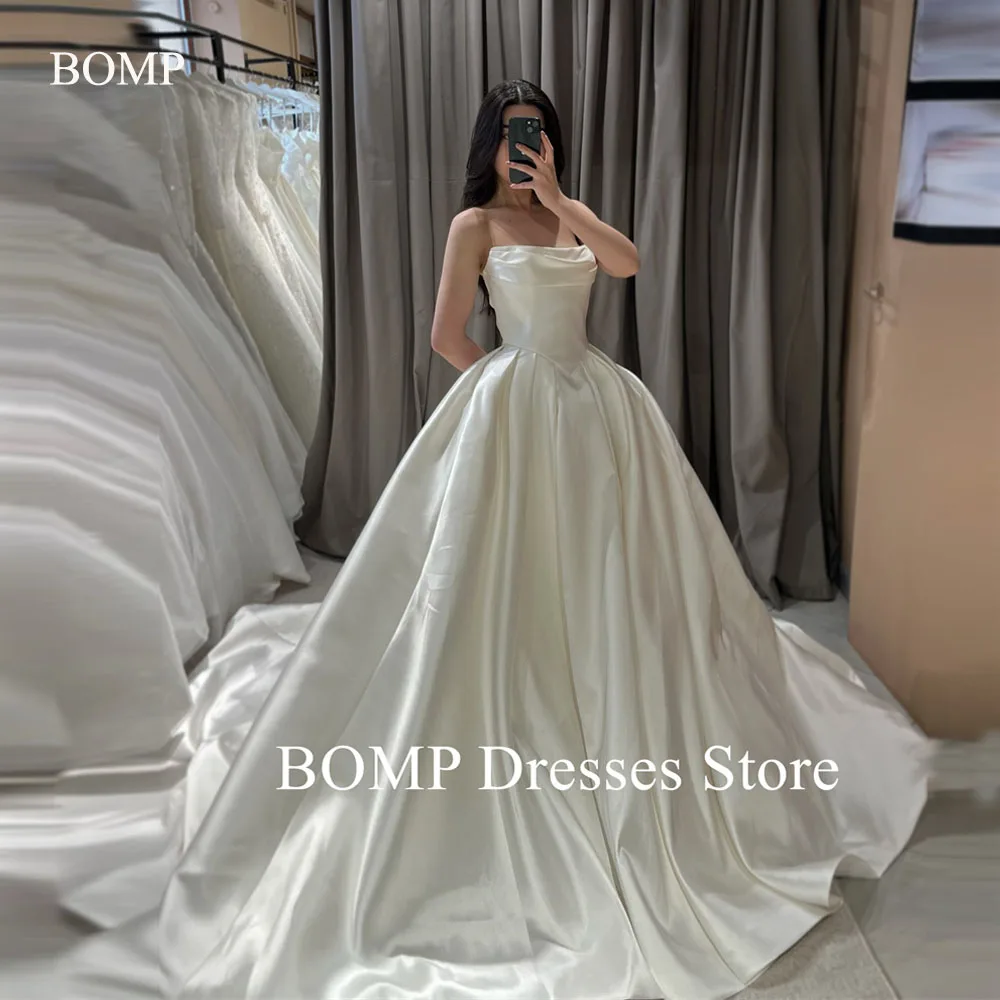 ชุดแต่งงานทรงเอไลน์แบบเรียบง่าย สายเดี่ยว ผ้าซาติน จับจีบ ยาวแบบชัพเพล  ชุดเจ้าสาวแบบปรับแต่งได้ สไตล์เจ้าหญิง