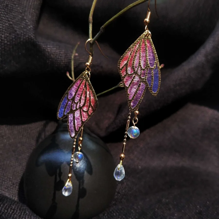 

Butterfly Tassel Colored Glaze Water Drop Earrings