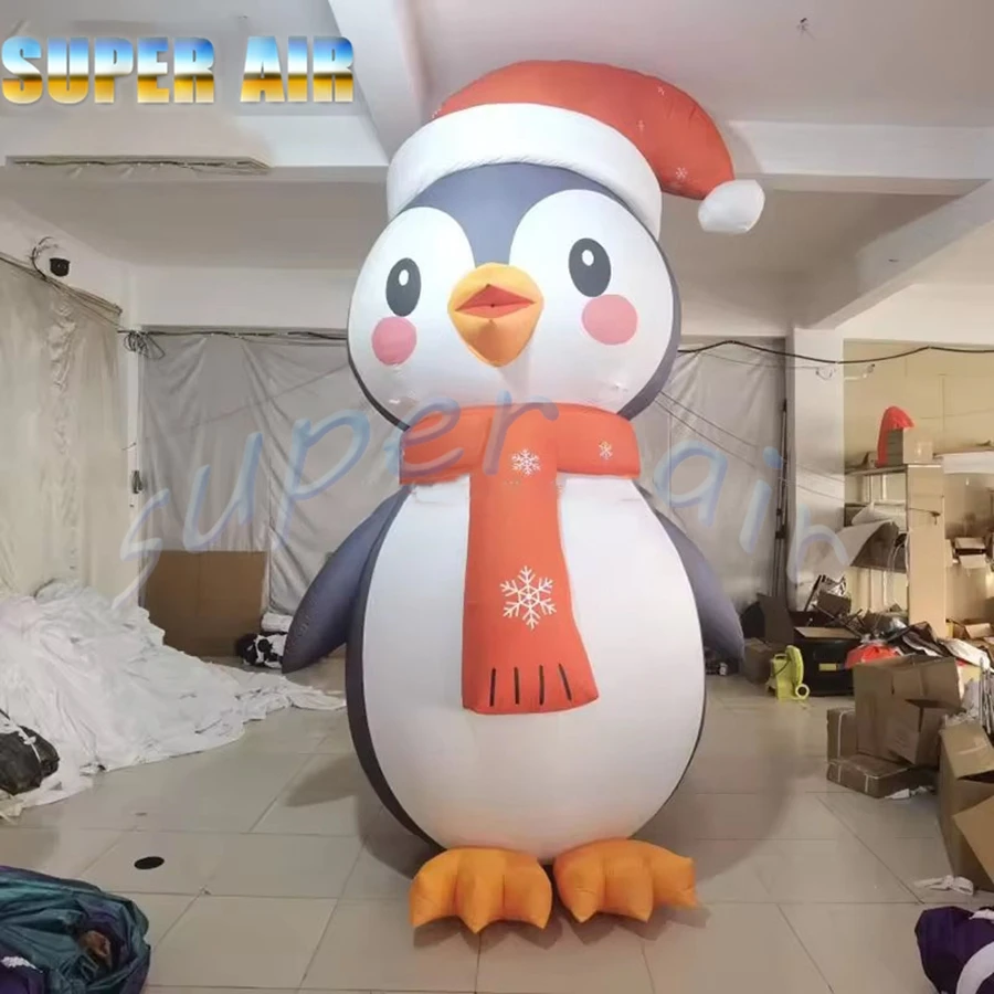 Pinguino natalizio gonfiabile gigante dal design speciale natalizio con cappello per la decorazione della festa