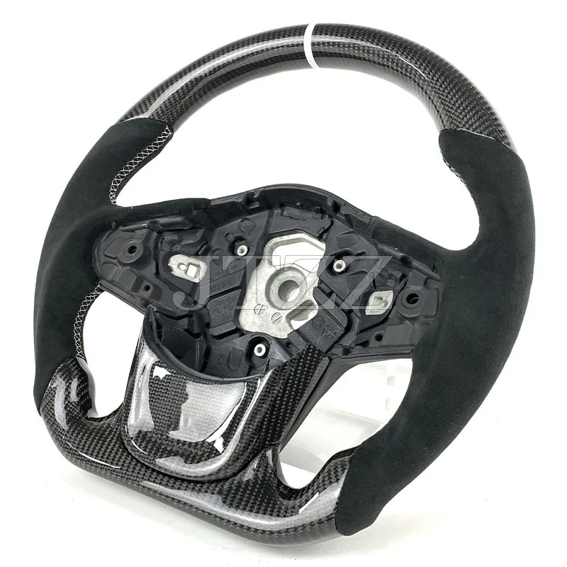 

Модификация рулевого колеса Fengxuan для Toyota Supra A90 с использованием замши и карбона