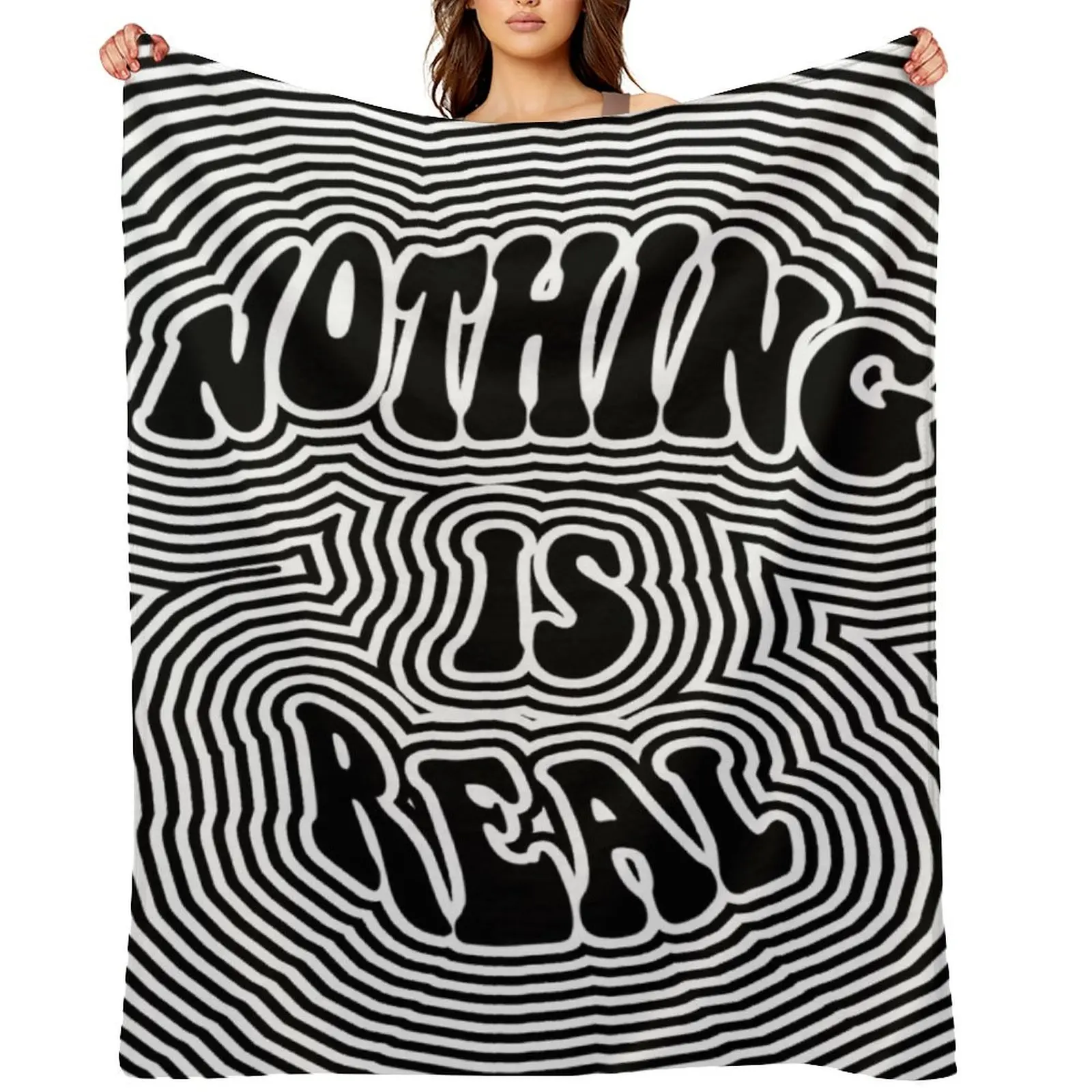 

Nothing is Real Throw Blanket Plaid on the sofa Furrys Luxury Designer Blankets