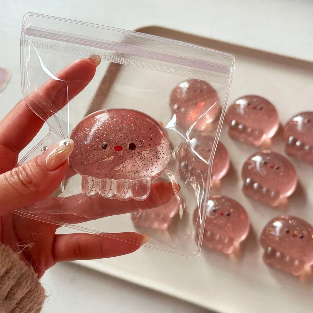 Taba Squishy Medusa Kawaii Alleviare lo stress OPP Confezione Regali Squishy Fidget Giocattoli per l'ansia e il rilassamento Accessorio da scrivania