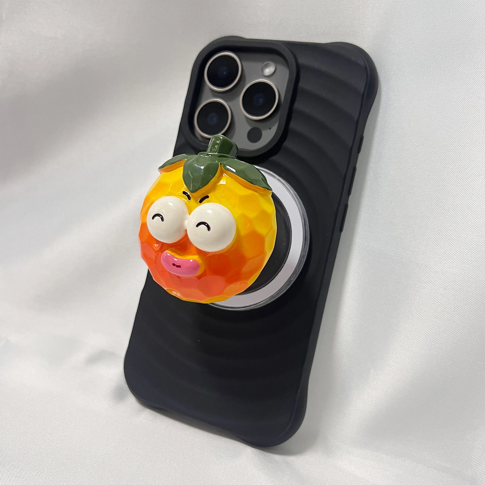 Simpatico supporto per telefono arancione con occhi grandi 3D Griptok Supporto per iPhone 17 16 PM Samsung Grip Tok Socket Staffa regalo per ragazza