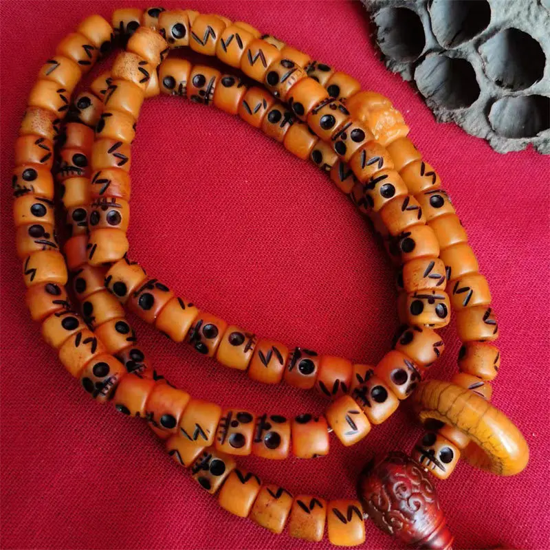 Bull bone A-Dai 108-piece set featuring a three-way carving with a running ring design and back cloud accessories