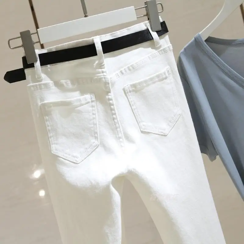 White micro flared jeans women's high waist autumn new Korean version slim fit versatile and elastic split flared pants