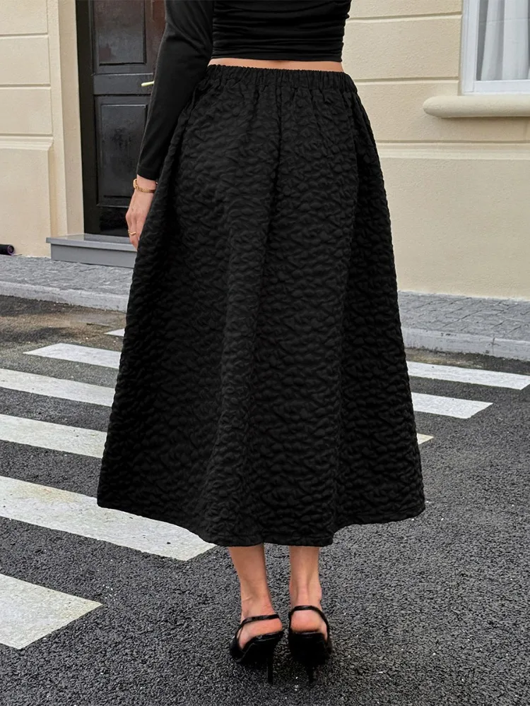 Uoozee Women's Black Textured Elegant Party Evening A-Line Skirts 2026 New High Waisted Pleated Urban Office Midi Skirt
