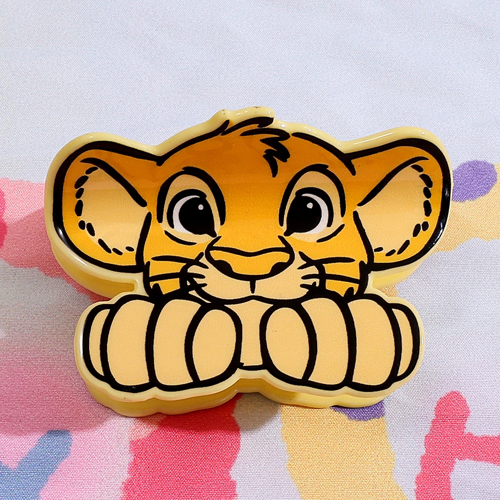 O acessório de cabelo da jovem imagem Simba na "O Rei Leão" da Disney, um prendedor de cabelo multifuncional