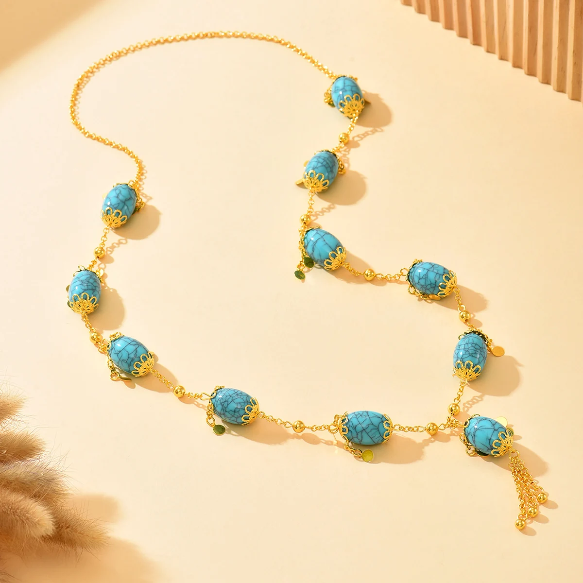 

Fatima A High-End Long-Length Collar Necklace, And A Retro Court Style Sweater Chain.Striking Blue Round Ball Chain Pendant,
