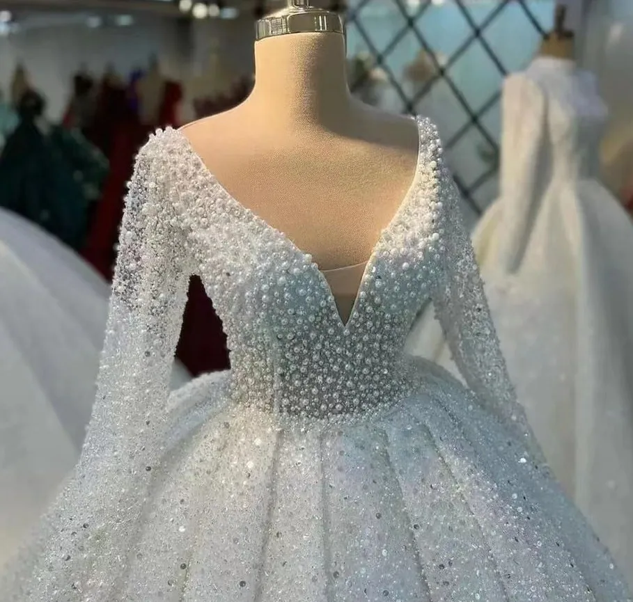 

Luxury African Wedding Dresses 2025 V-neck Long Sleeves Lace Pearls Bridal Princess Gowns Robe De Mariee Vestido De Noiva