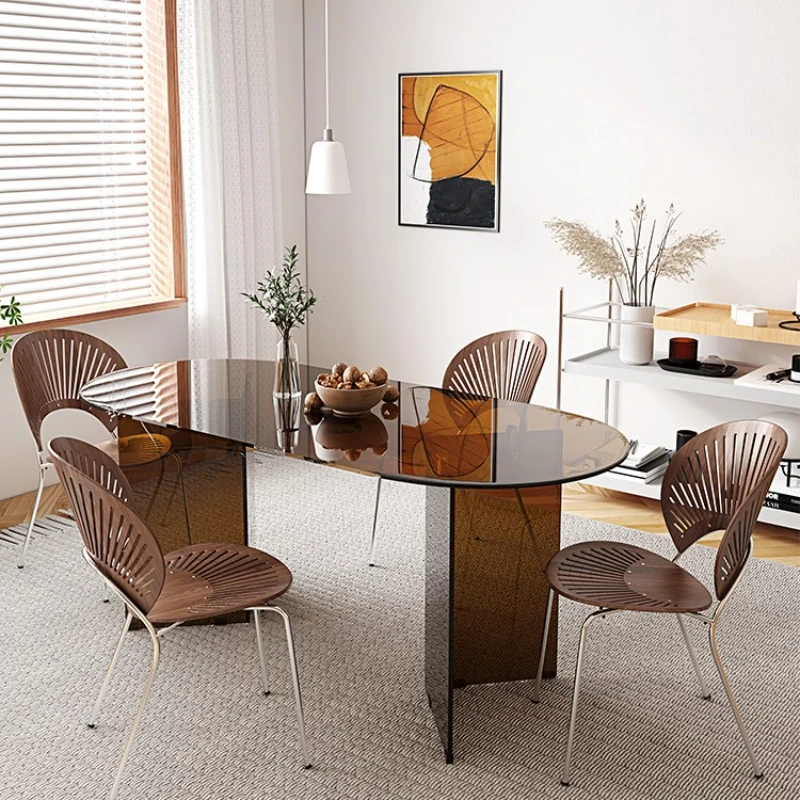 

Tempered glass dining table and chairs combined with household light luxury designer oval