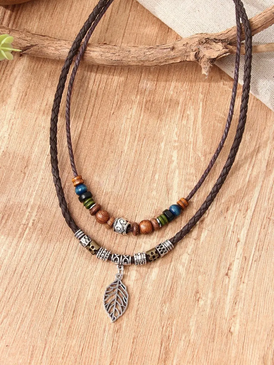 

Layered Beaded Necklace With Leaf Charm Pendant