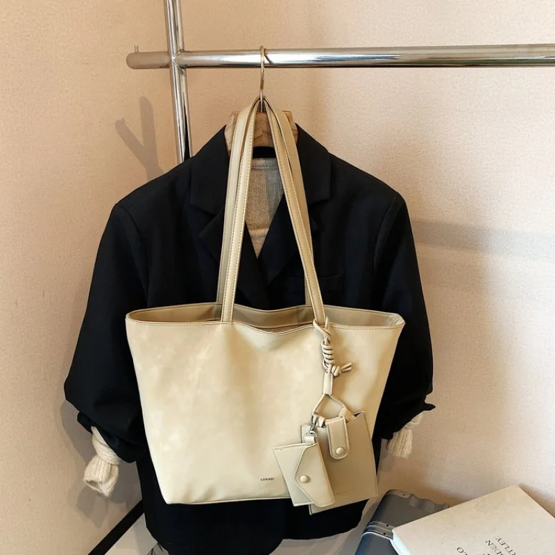 

Женская ручная сумка из высококачественной кожи и популярный классический элегантный стиль с повседневным простым дизайном ​