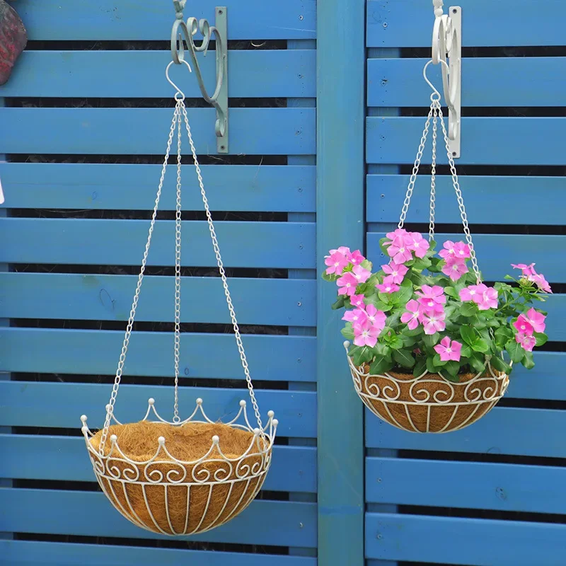 wo crown hanging baskets, with coconut palm hanging flower baskets, wrought iron old balconies, garden wall decoration