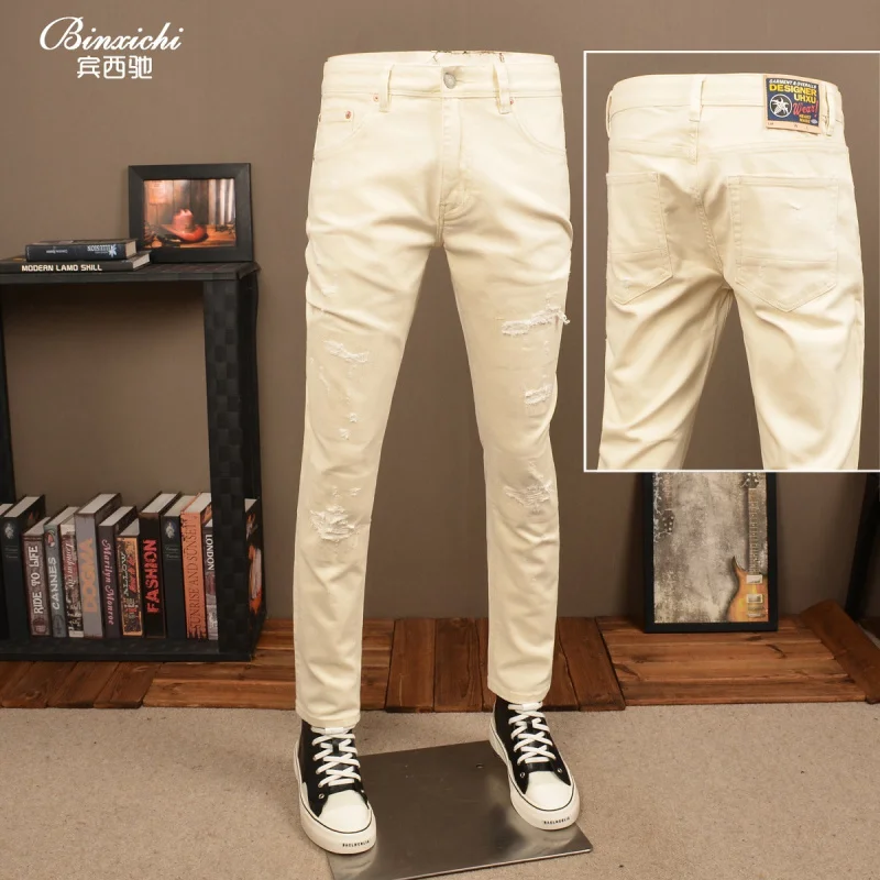 

Осень-зима 2025: черные рваные джинсы, мужские модные, крутые и эластичные повседневные мужские брюки высокого класса с небольшой ногой