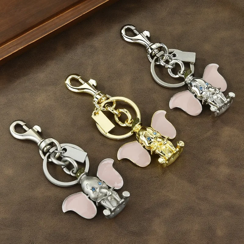 

Bag pendants, car keychains, metal Dumbo cartoon, cute ears, movable pendants