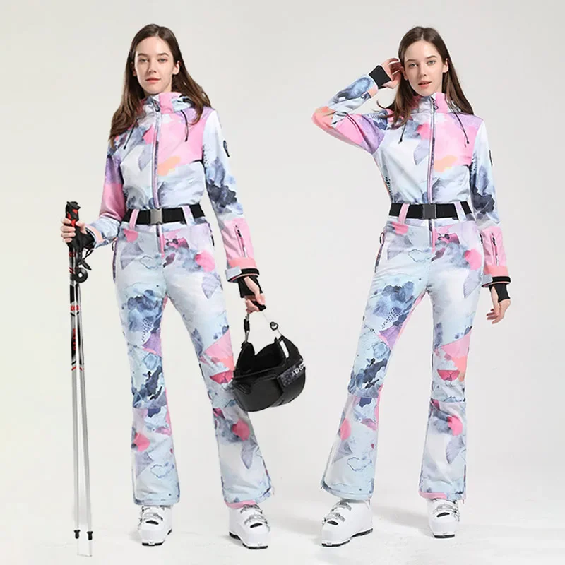 2025 شتاء جديد بذلة التزلج النساء قطعة واحدة بدلة تزلج في الهواء الطلق على الجليد الستر ضئيلة الدافئة عموما يندبروف ملابس مقاومة للماء