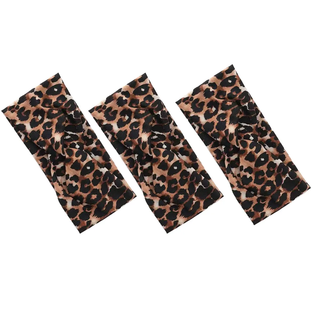 Nuove donne di moda croce tinta unita elasticità stampa leopardo fasce per fiori ragazze turbante vintage trucco accessori per capelli