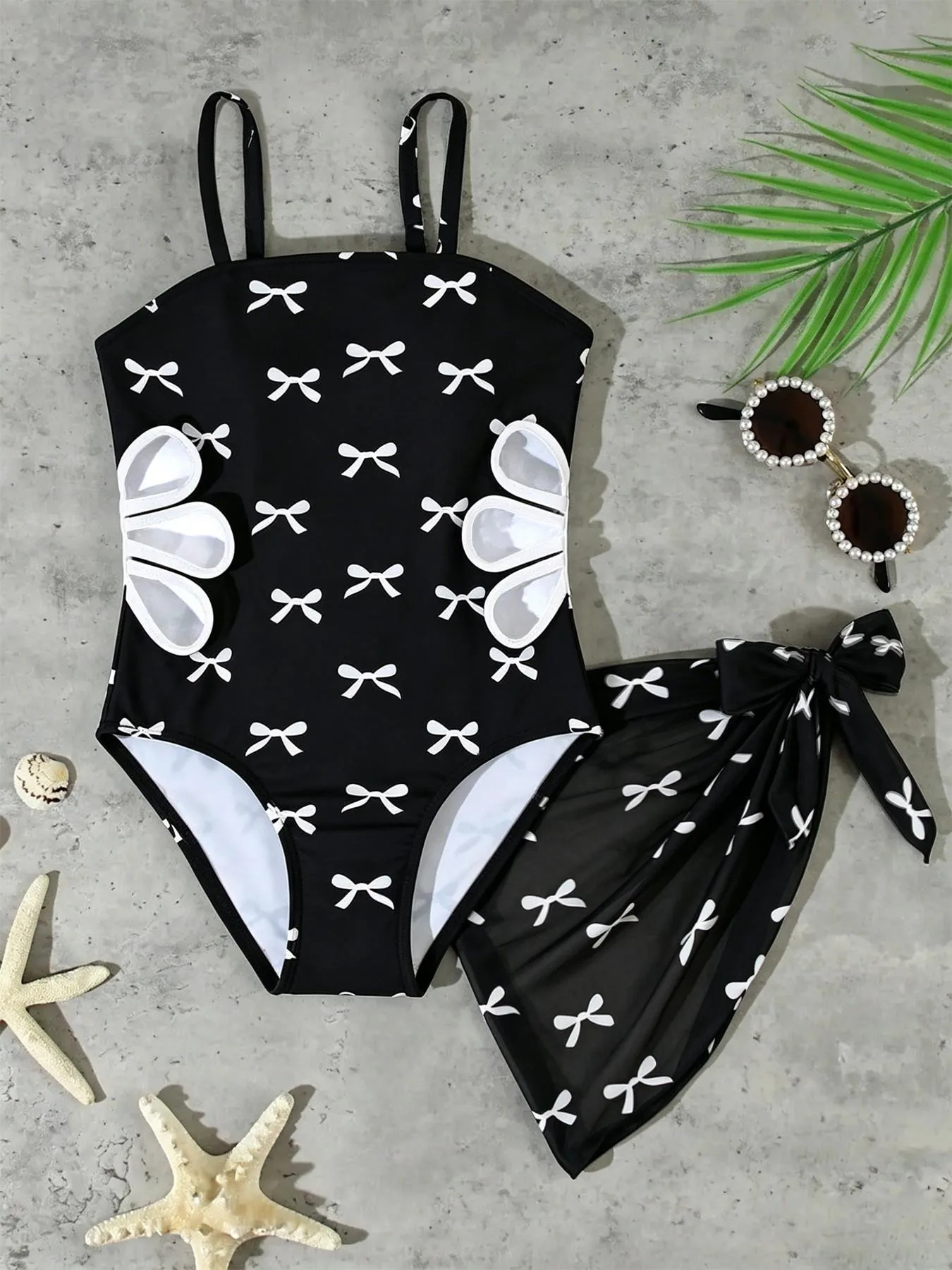Conjunto de ropa de playa para niñas, traje de baño de una pieza con estampado de lazo negro y falda de malla, 2 piezas